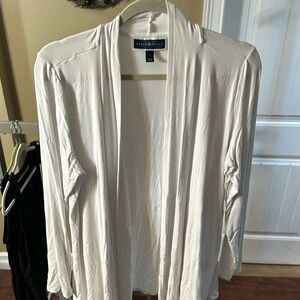 Karen Scott.  White cardigan